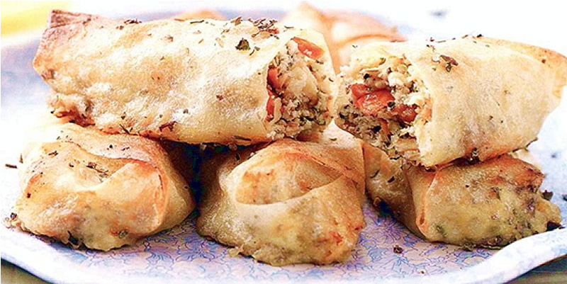 Rolls with dried tomatoes and Squacquerone di Romagna PDO